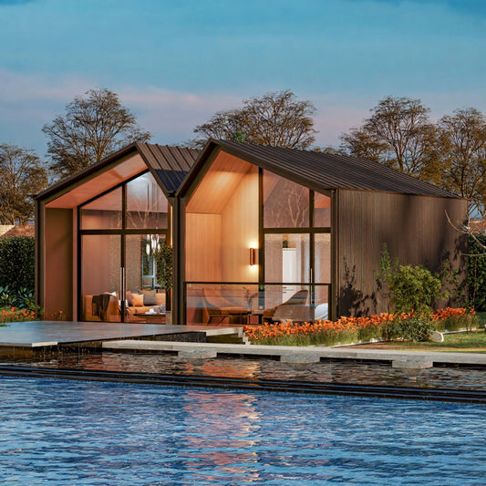 Modern house with large glass windows by a pool. Prefab villa, prefab house, prefabricated home, prefab Cyprus, modular villa, modular house, barn house