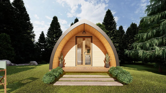 Wooden pod structure in a garden setting with trees in the background. Prefab house Cyprus. Prefabricated modular home Cyprus. Prefabcy. Buy modular home in Cyprus.