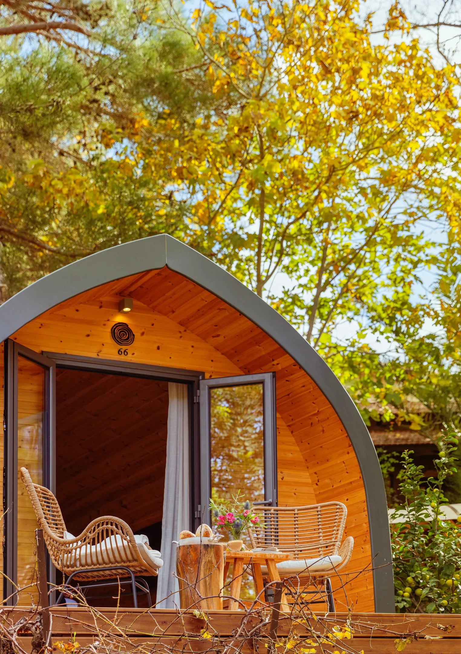 Wooden pod with outdoor furniture in a natural setting, Prefabcy.com, prefab home Cyprus, prefabricated modular house, buy in Cyprus